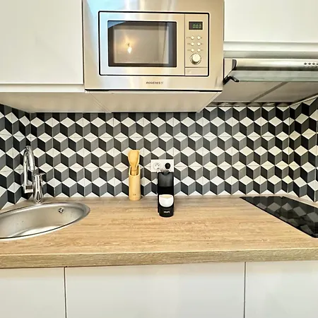 By Eiffel Tower And Roland Garros * Paris